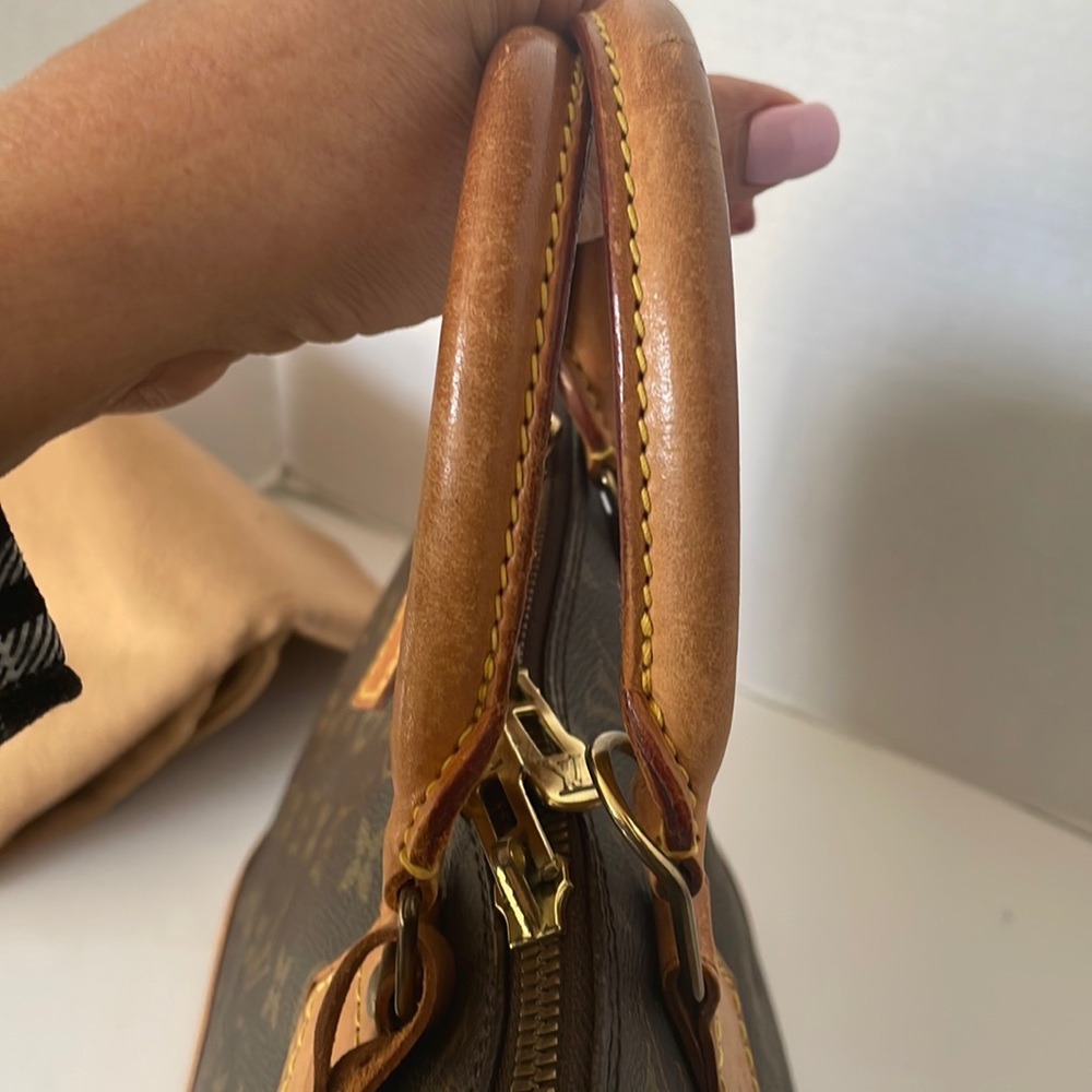 Authentic LOUIS VUITTON Alma Monogram Handbag - Picture 12 of 17